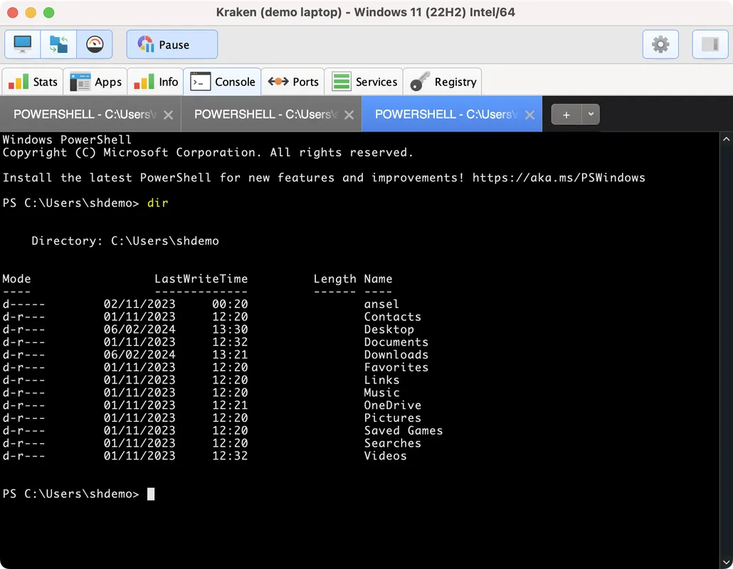 Windows PowerShell window open on a Windows 11 laptop displaying a directory listing of user folders with names and last write times.