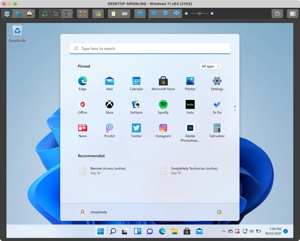 Windows 11 desktop showing the Start menu with pinned apps including Edge, Mail, Calendar, Microsoft Store, Photos, Settings, Office, Xbox, Solitaire, Spotify, Hulu, To Do, News, PicsArt, Twitter, Instagram, Adobe Photoshop, and Calculator.