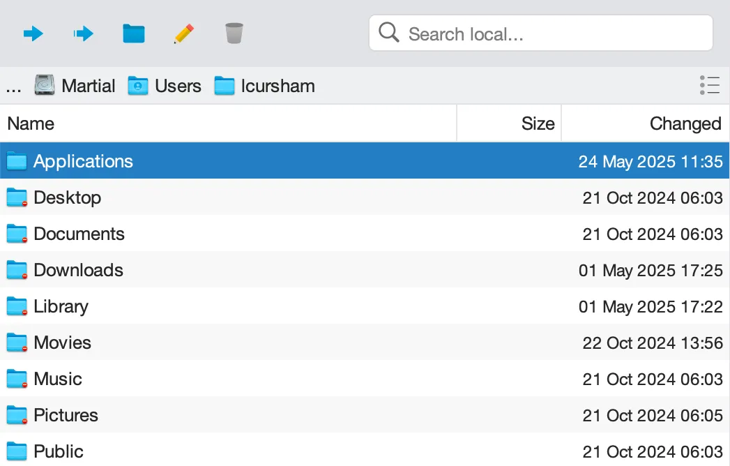 File explorer window showing folders such as Applications, Desktop, Documents, Downloads, Library, Movies, Music, Pictures, and Public with last modified dates.